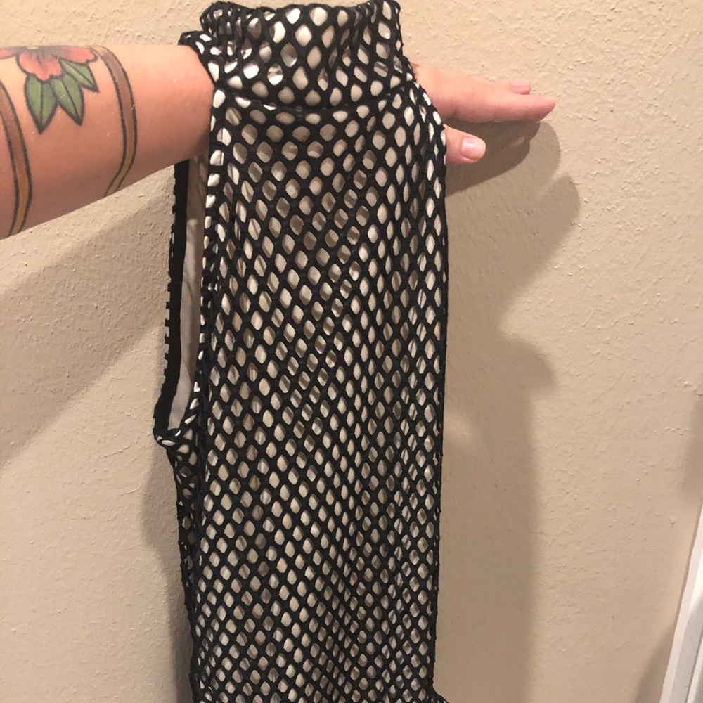 FISHNET bodysuit. (More photos upon request)